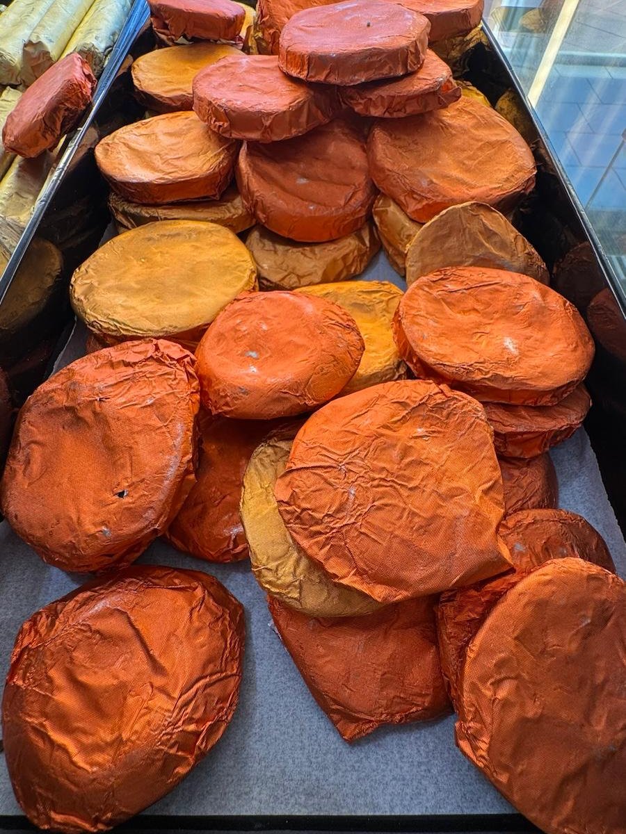 Candied oranges dipped in chocolate, a traditional Cretan sweet at Bakery Kissamos